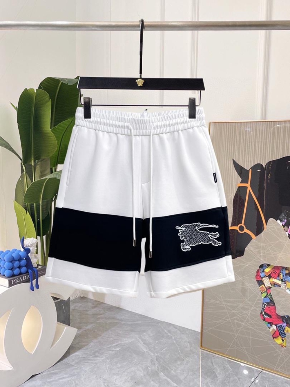 Burberry White Shorts with Gold Logo Patch
